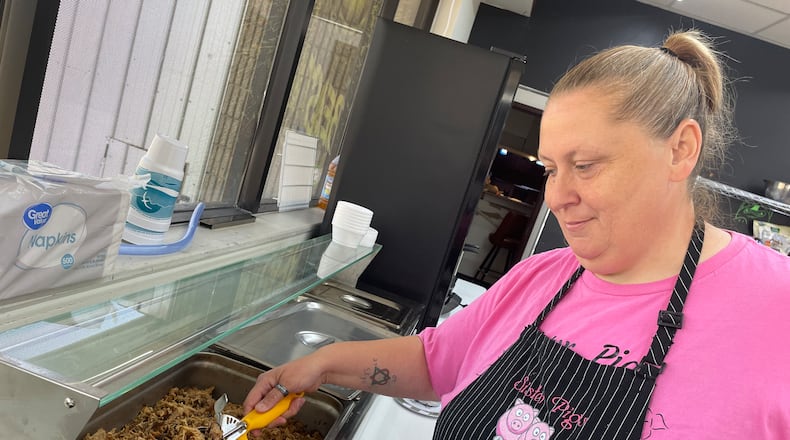 Sister Pigs Eats, a hidden gem in the Xenia community owned by Michell Rubio (pictured), can be found inside Stan’s One Stop on the corner of W. Second St. and S. Allison Blvd. NATALIE JONES/STAFF