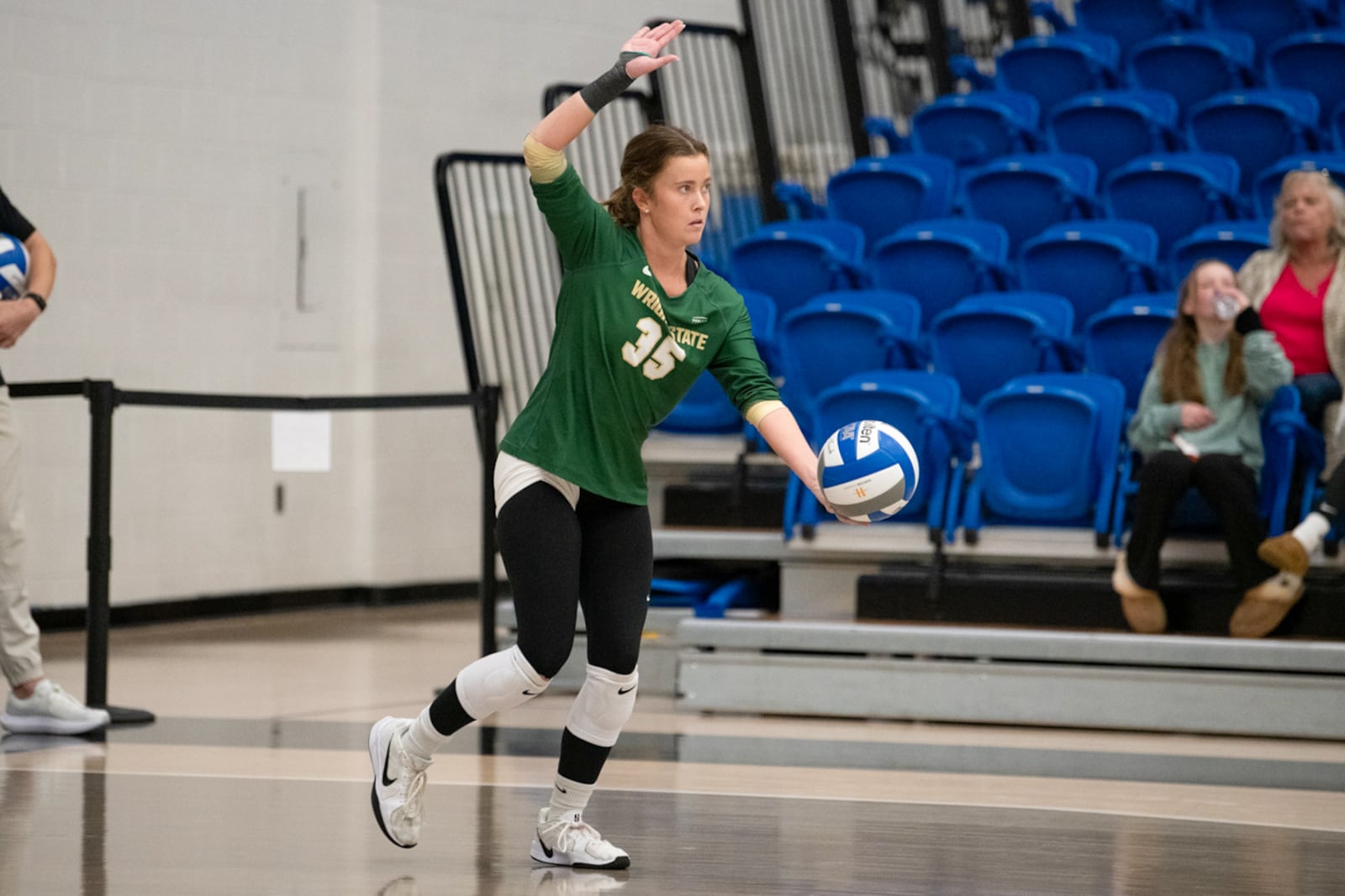 Wright State University's Ella Gaona prepares to serve the ball during a recent match at Purdue Fort Wayne. RACHEL VON / CONTRIBUTED PHOTO