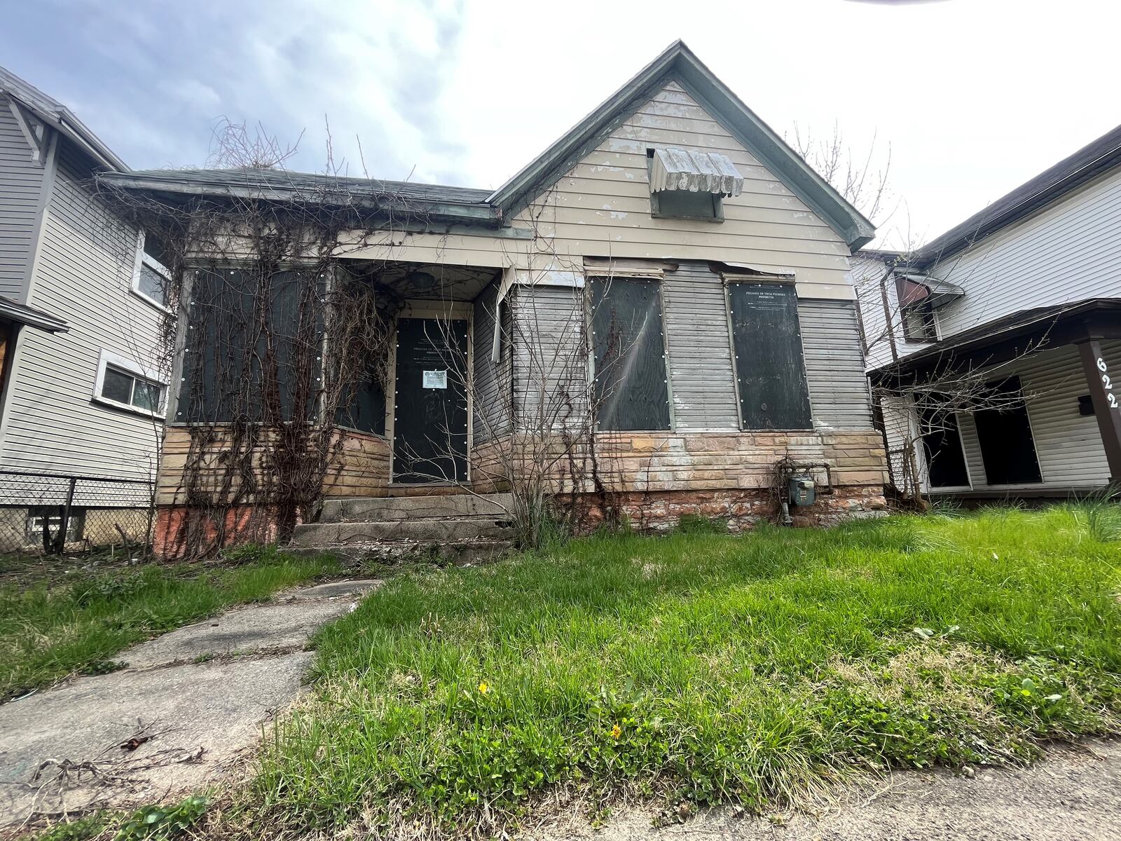 A vacant and abandoned home in East Dayton. CORNELIUS FROLIK / STAFF
