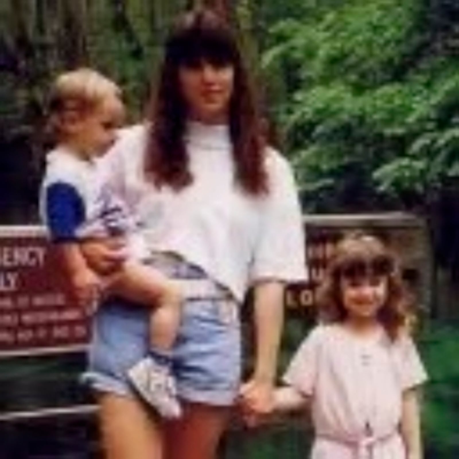 This undated photo released by Maria David shows her sister, Carmen Gayheart, with her children, Chad and Jessica. (Maria David via AP)