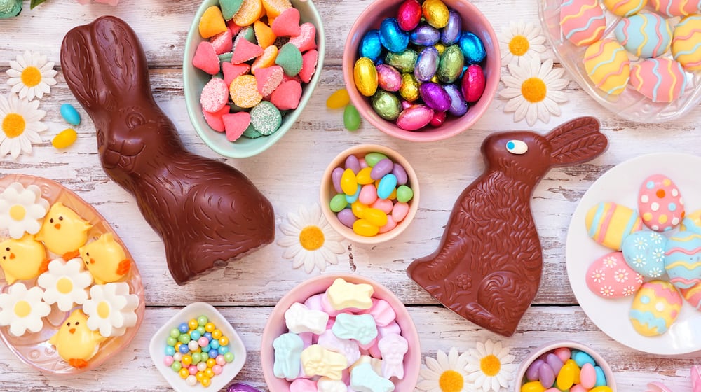 Easter candy table scene. Chocolate bunnies, candy eggs and a variety of sweets. ISTOCK
