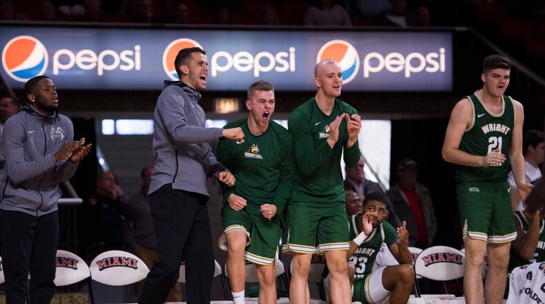 Wright State’s Aleksandar Dozic (second from left) cheers on his teammates during a game vs. Miami at Millett Hall on Nov. 9, 2019. Joseph Craven/WSU Athletics
