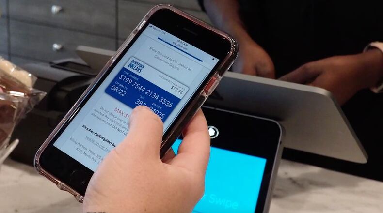 Since launching in December of 2020, the Downtown Dayton Partnership's Downtown Dollars e-gift card program has invested $48,000 into downtown Dayton businesses. CONTRIBUTED