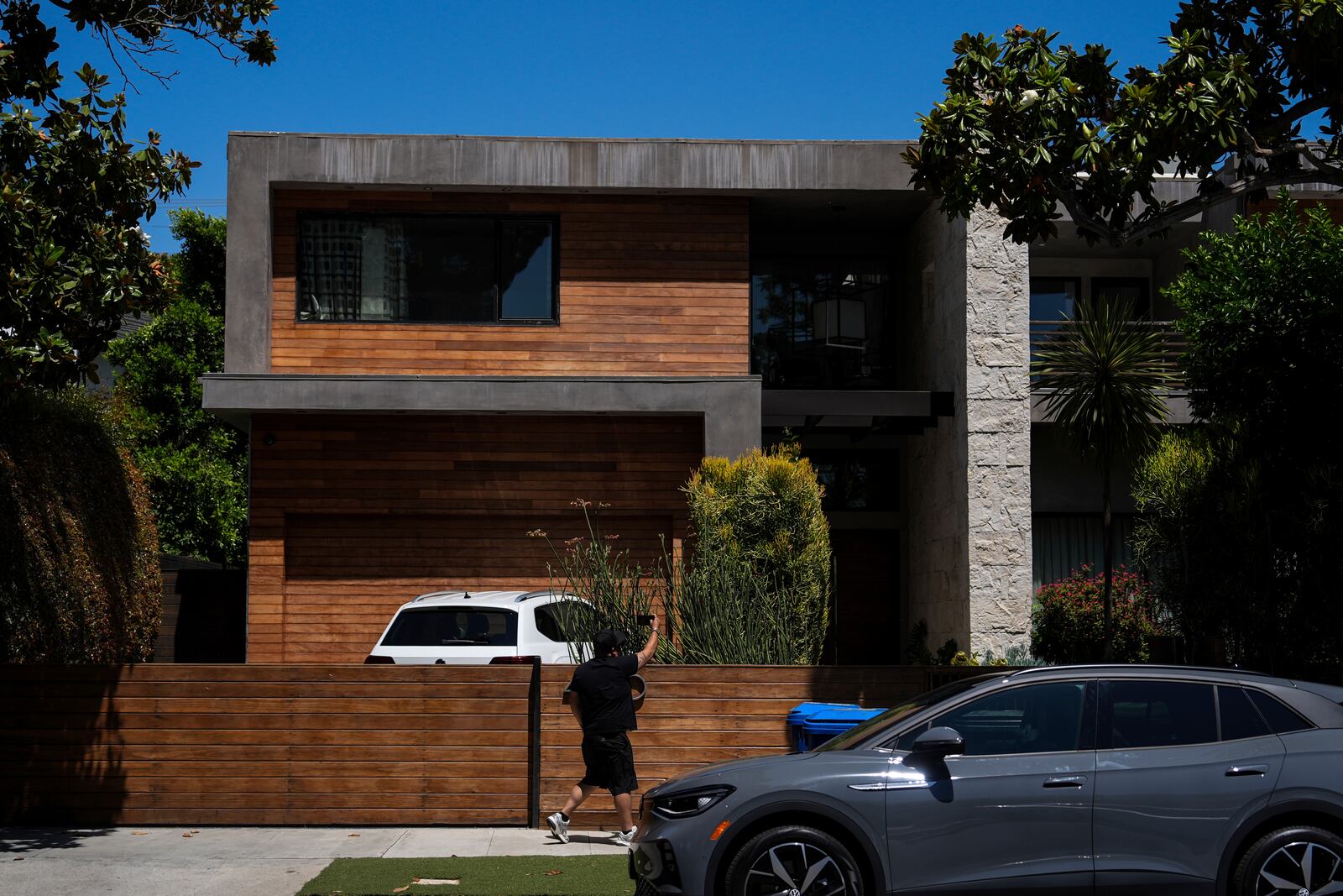 A person records the residency of Mexican boxer Julio César Chávez Jr., Thursday, July 3, 2025, in Los Angeles. (AP Photo/Jae C. Hong)