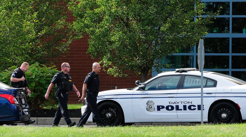 Dayton police determined a report of an active shooter at Belmont High School on Friday, Sept. 23, 2022 was a hoax. MARSHALL GORBY / STAFF