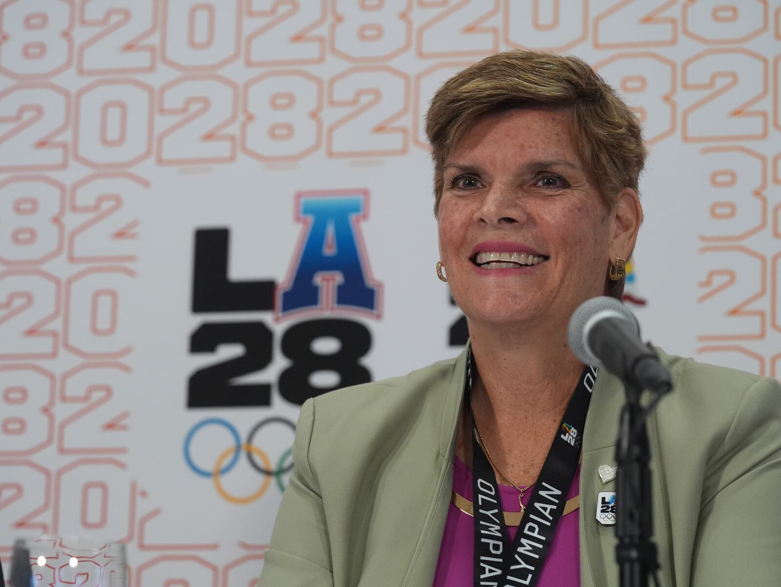 Nicole Hoevertsz, a former Olympian from Aruba who competed in synchronized swimming at the 1984 Los Angeles Olympic Games, now the IOC vice president and LA28 Coordination Commission chair, remembers her past experience competing in Los Angeles during a news conference in Los Angeles, Thursday, June 5, 2025. (AP Photo/Damian Dovarganes)