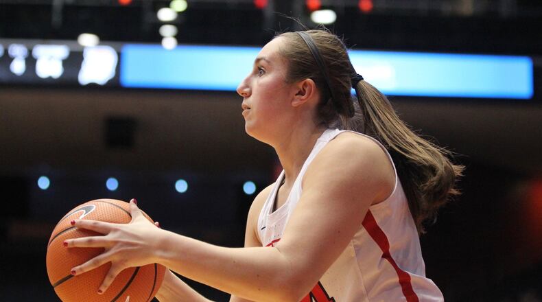 Dayton’s Lauren Cannatelli shoots against Duquesne on Jan. 31, 2018, at UD Arena. David Jablonski/Staff