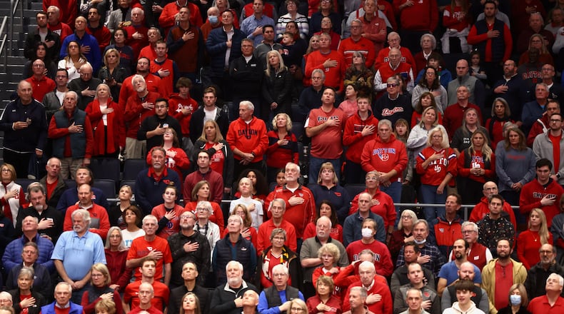 Dayton fans stand for the national anthem before a game against Western Michigan on Wednesday, Nov. 30, 2022, at UD Arena. David Jablonski/Staff
