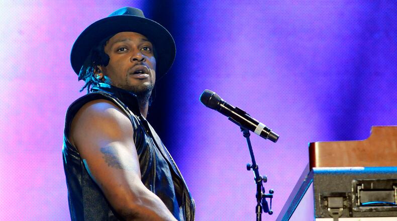 FILE - This July 6, 2012 file photo D'Angelo performs at the Essence Music Festival in New Orleans. (Photo by Cheryl Gerber/Invision/AP, File)
