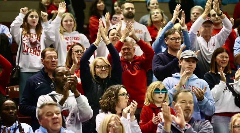 Dayton fans cheer the team after a loss to Houston in the Charleston Classic championship game on Sunday, Nov. 19, 2023, at TD Arena in Charleston, S.C. David Jablonski/Staff