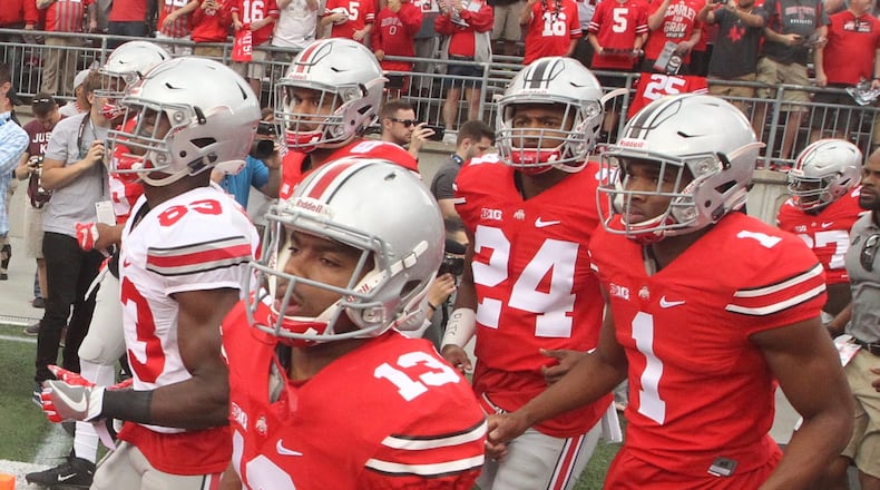 Ohio State takes the field at Ohio Stadium before the spring game on Saturday, April 15, 2017, in Columbus. David Jablonski/Staff