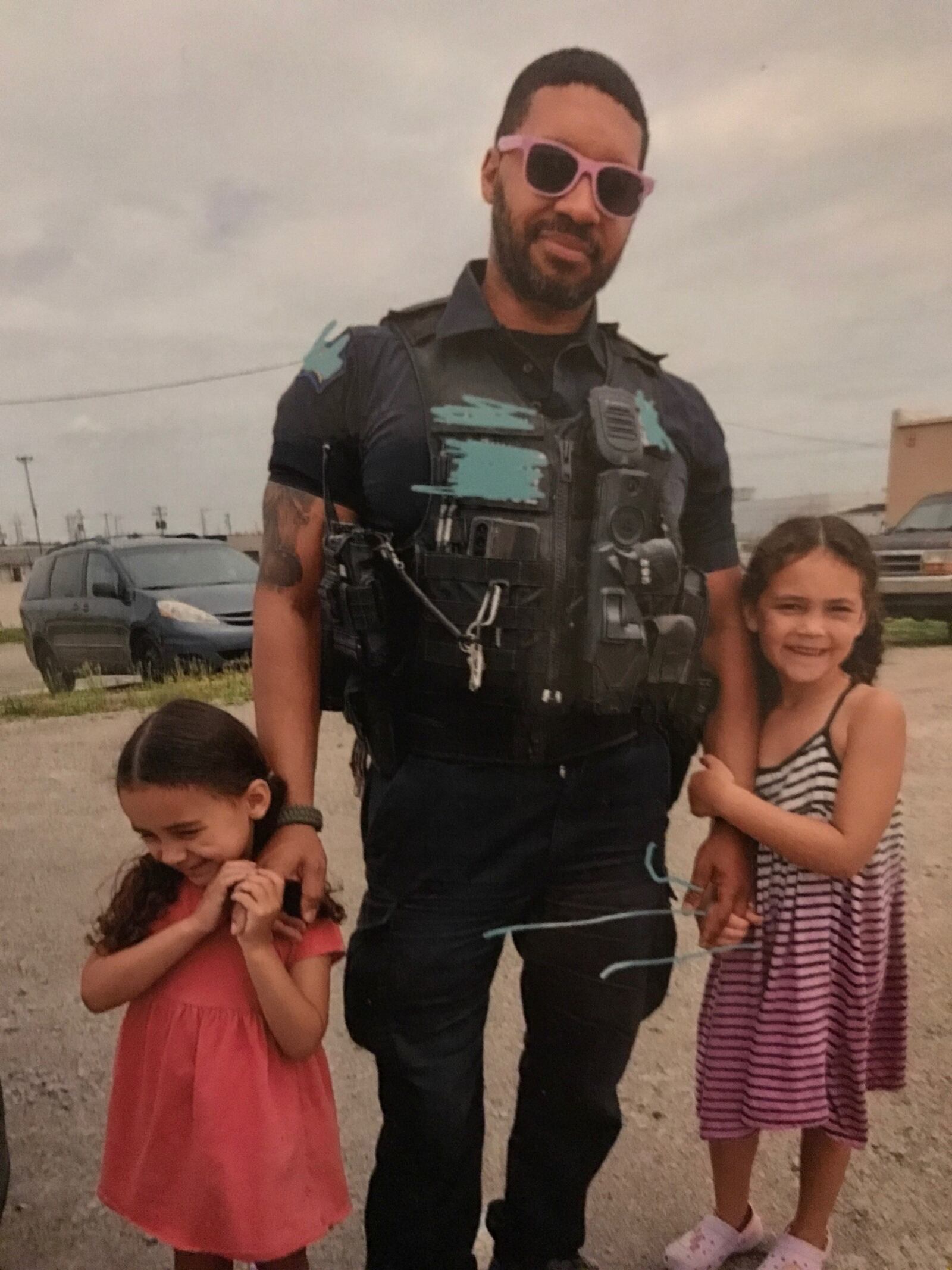 Dayton Police Officer Byron Branch with his two daughters, Chloe, who is now 7, and Peyton who is 5. CONTRIBUTED
