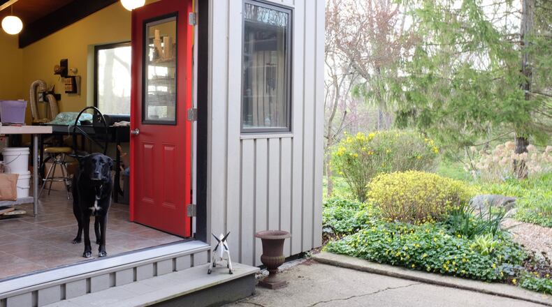 Kevin Tunstall and Mark Brewer’s home will be one of the featured gardens during the 2018 DeWeese Ridgecrest Civic Association Garden Tour. CONTRIBUTED