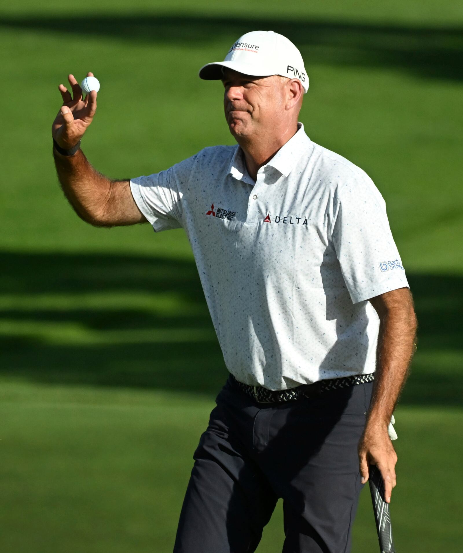 Stewart Cink reacts after sinking a birdie on the 17th hole on the first day at the U.S. Senior Open Championship at Broadmoor Golf Club in Colorado Springs, Colo., Thursday, June 26, 2025. (Jerilee Bennett/The Gazette via AP)