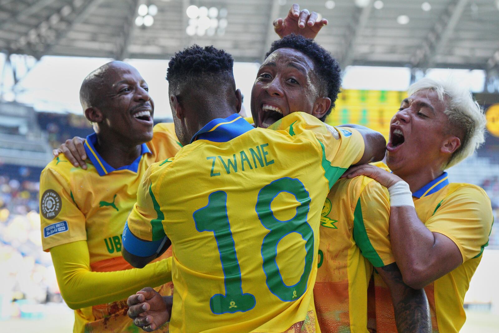 Mamelodi Sundowns celebrate after scoring opening goal during the Club World Cup Group F soccer match between Mamelodi Sundowns and Borussia Dortmund in Cincinnati, Saturday, June 21, 2025. (AP Photo/Jeff Dean)