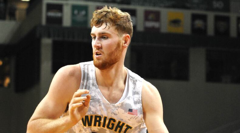 Wright State's Brandon Noel, 14, drives toward the basket during the first half of a non-conference game against Bowling Green at the Nutter Center on Tuesday, Nov. 15. DAVID A. MOODIE/CONTRIBUTING PHOTOGRAPHER