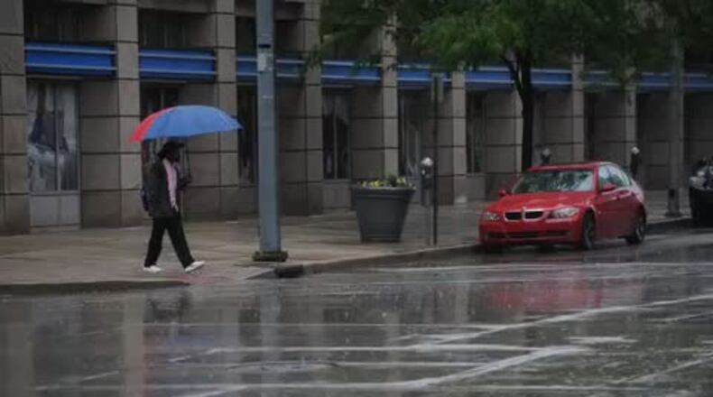 Rain falls in downtown Dayton