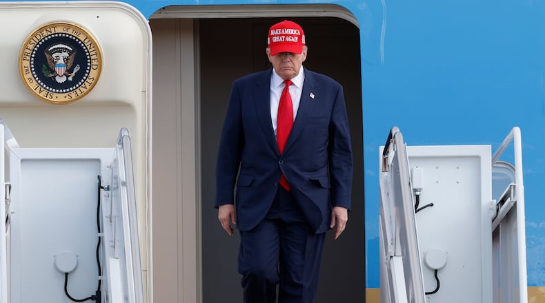 President Donald Trump walks down the stairs of Air Force One upon his arrival at Joint Base Andrews, Md., Thursday, Oct. 30, 2025, after returning from Asia. (AP Photo/Luis M. Alvarez)