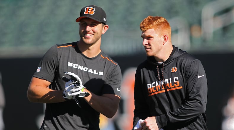 CINCINNATI, OH - OCTOBER 23: Tyler Eifert #85 and Andy Dalton #14 of the Cincinnati Bengals talk while warming up prior to the start of the game against the Cleveland Browns at Paul Brown Stadium on October 23, 2016 in Cincinnati, Ohio. (Photo by John Grieshop/Getty Images)