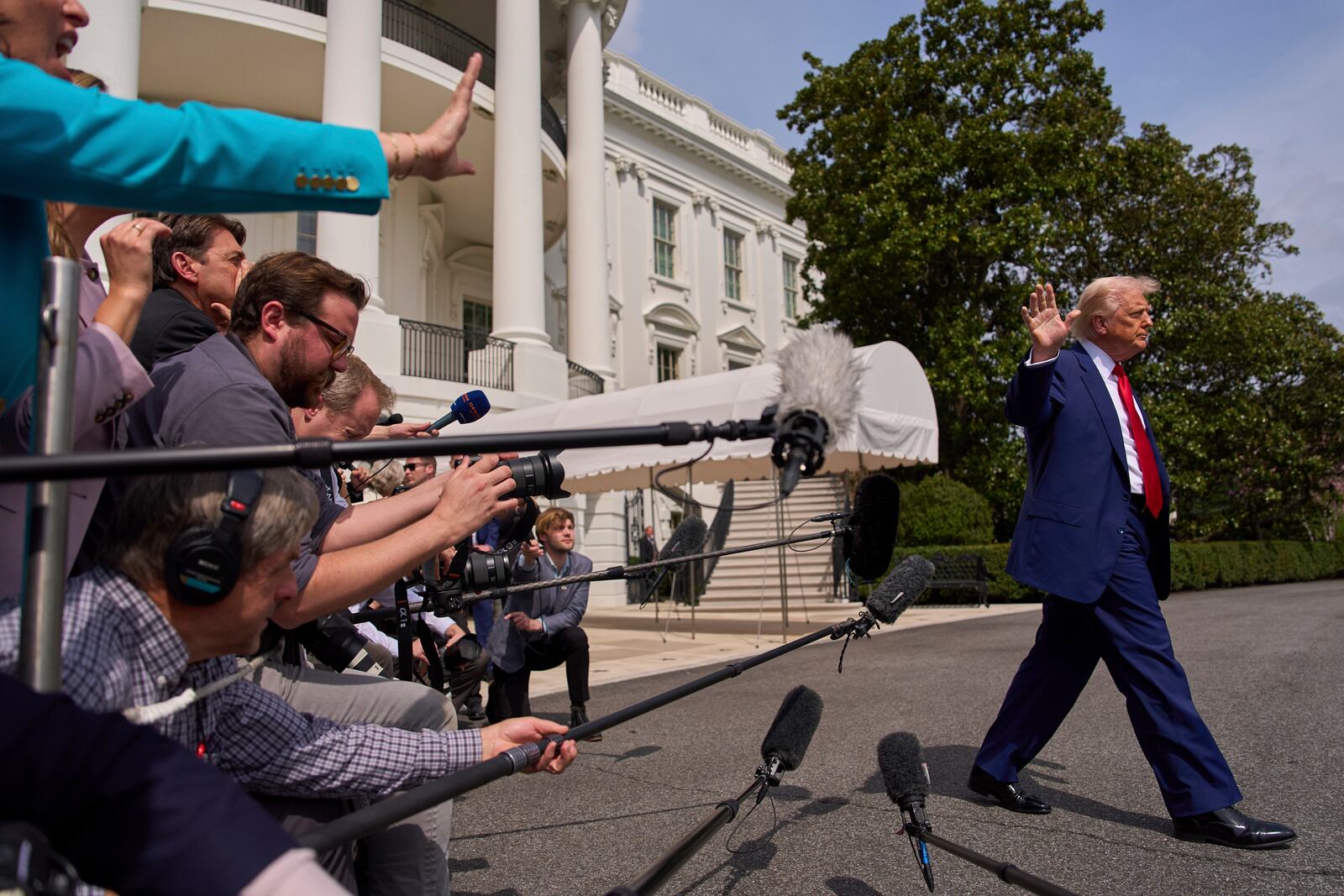 President Donald Trump walks to board Marine One after speaking with reporters on the South Lawn of the White House, April 3, 2025, in Washington. (AP Photo/Evan Vucci)