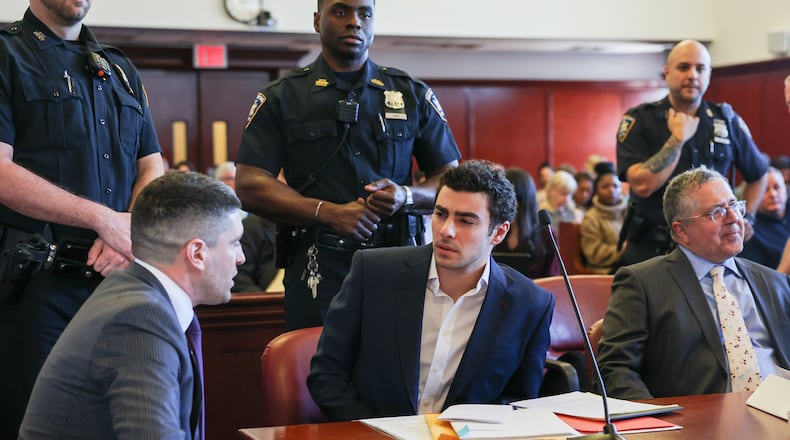 FILE - Luigi Mangione appears in Manhattan Criminal Court for an evidence hearing, Dec. 18, 2025, in New York. (Shannon Stapleton/Pool Photo via AP, File)