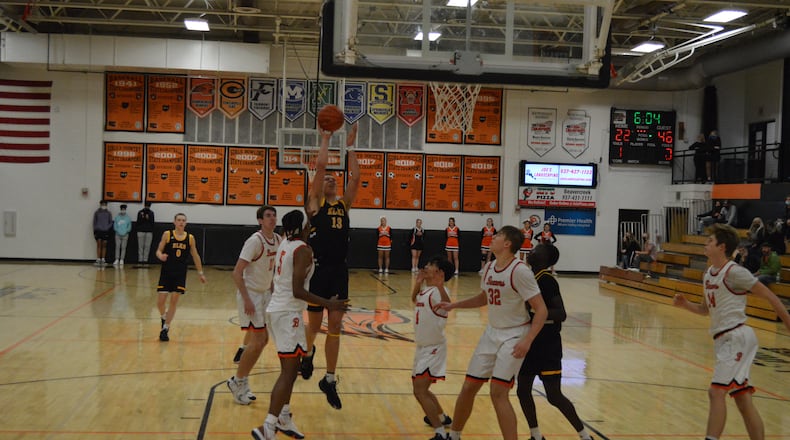 Centerville's Rich Rolf puts up a shot during Friday night's game at Beavercreek. Eric Frantz/CONTRIBUTED