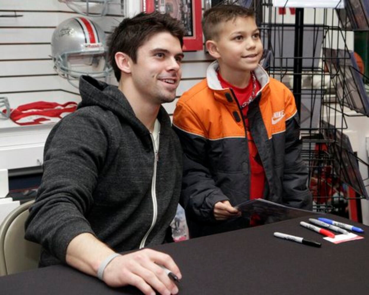 OSU's Dane Sanzenbacher signs autographs