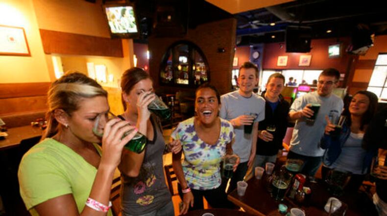Patrons of Milano's and Buffalo Wild Wings on Brown Street started their day with Blue Beer on Wednesday, March 10, 2010 as an early start to St. Patrick's Day celebrations for UD Students.