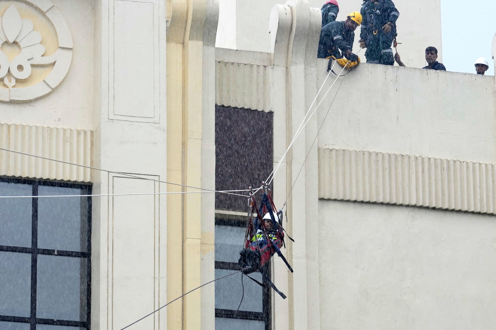 Civil Defense Services, National Disaster Response Force NDRF and Mumbai Fire Brigade workers take part in a mock drill in Mumbai, India, Wednesday, May 7, 2025, amid rising fears of wider conflict following India's strikes in Pakistan. (AP Photo/Rajanish Kakade)