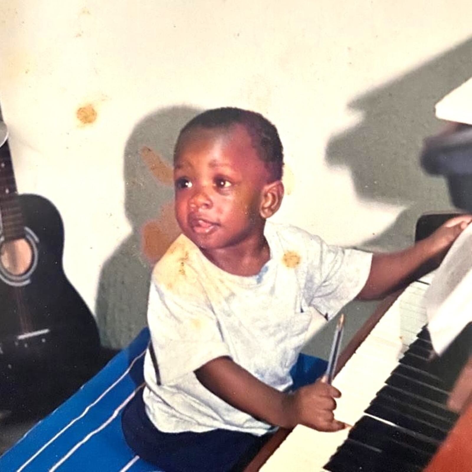 At 18 months, Sam Alamutu already was at the piano. He wouldn’t go out for basketball until he was 10. CONTRIBUTED PHOTO