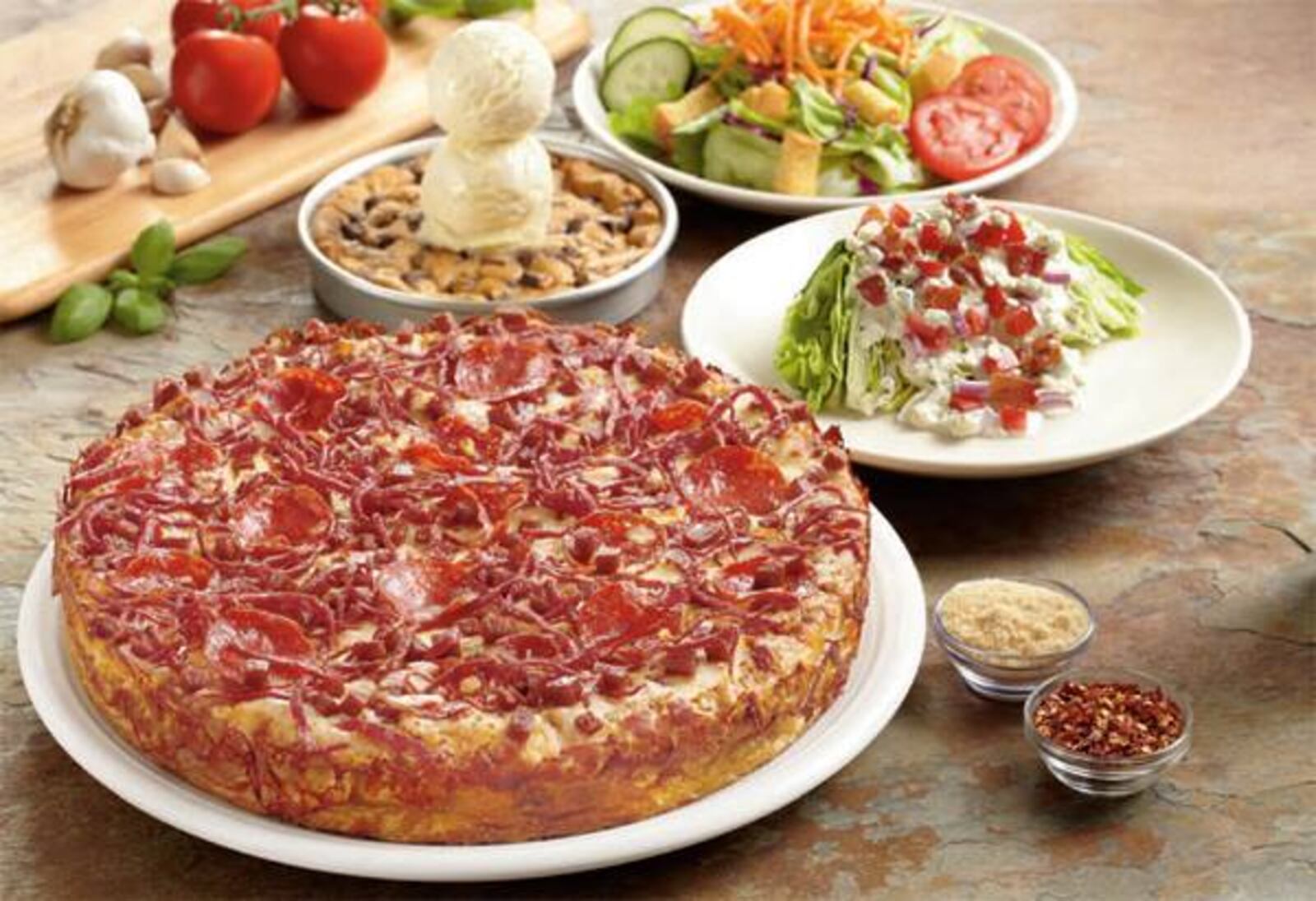 ‘Party For Two’ sale at BJ’s Restaurant & Brewhouse offers two soups or salads, any medium pizza and a pizookie for $19.95 until Nov. 11, 2013. (Source: BJ’s Restaurant & Brewhouse’s Facebook page)