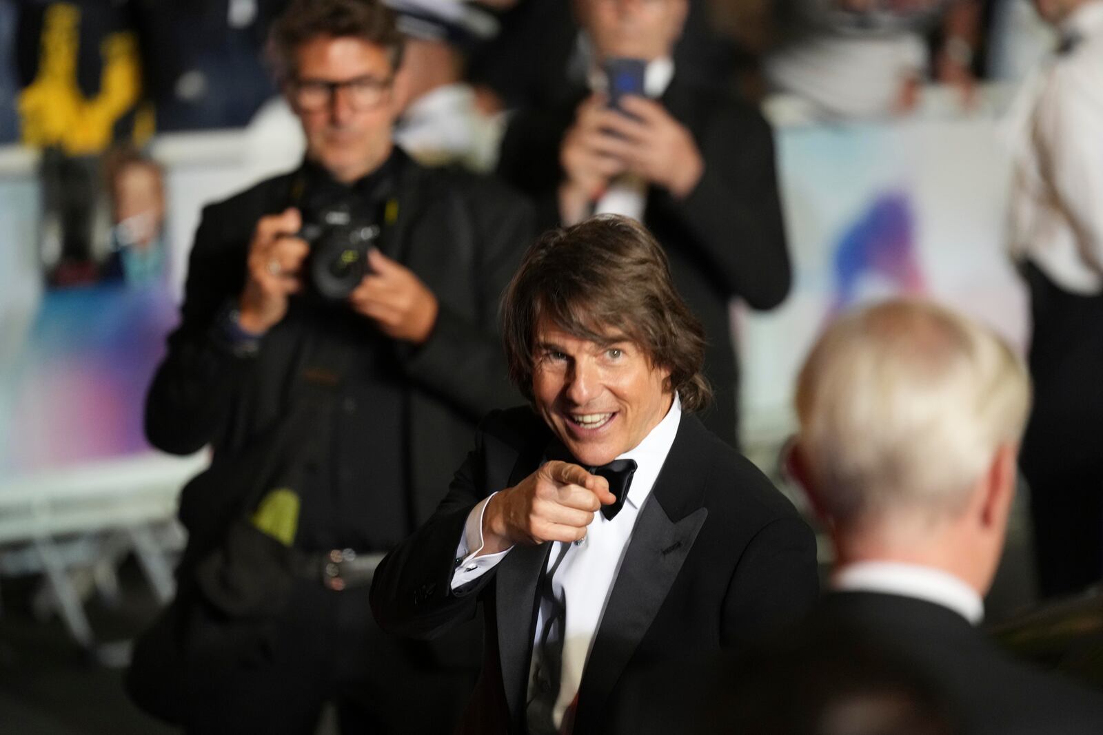 Tom Cruise poses for photographers upon departure from the premiere of the film 'Mission: Impossible – The Final Reckoning' at the 78th international film festival, Cannes, southern France, Wednesday, May 14, 2025. (AP Photo/Natacha Pisarenko)