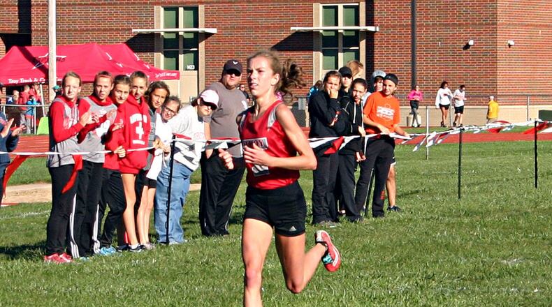 Morgan Gigandet led Troy’s sweep of the top three spots in the Miami County championship meet Saturday. GREG BILLING / CONTRIBUTED