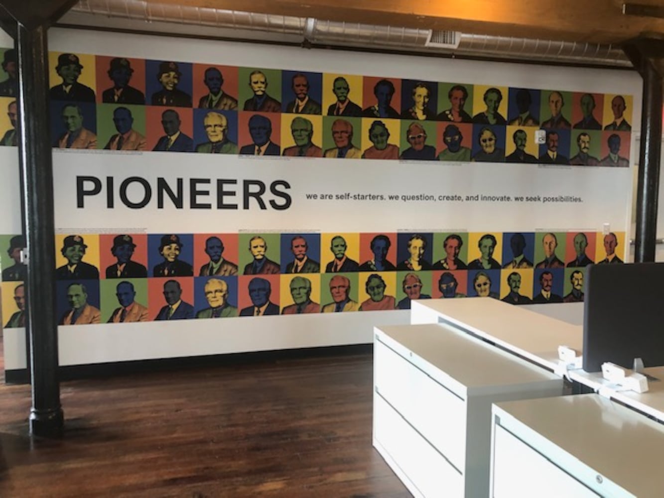PHOTOS: Inside the new downtown Dayton office that has an industrial slide