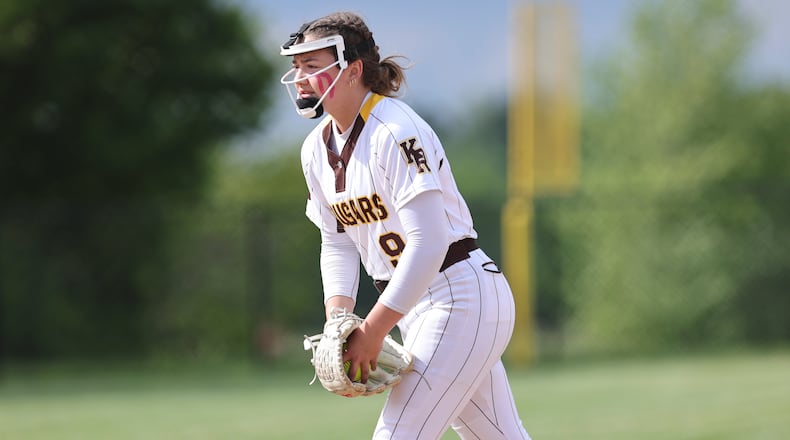 Kenton Ridge High School freshman pitcher Ivee Rastatter prepares to throw a pitch during their Division IV district final game against CHCA on Friday, May 23 at Valley View High School. The Cougars won 11-0. MICHAEL COOPER / STAFF