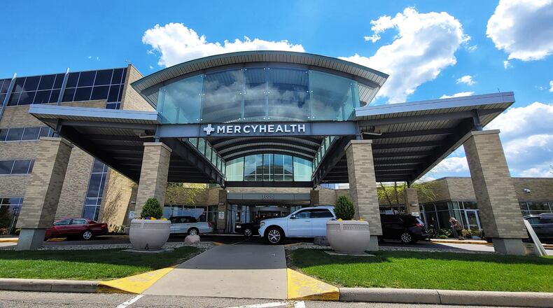 A Fairfield doctor who serves as chief medical officer of Bon Secours Mercy Health’s Medical Group recently offered advice to doctors, nurses and social workers across the country about how best to help “long-haul” COVID-19 patients. NICK GRAHAM/STAFF