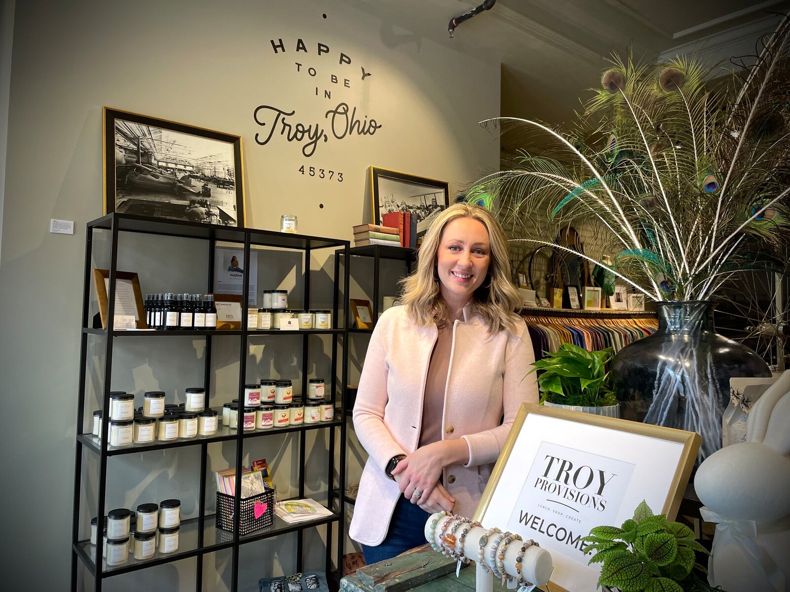 Troy Provisions, located at 11 W. Main St. in downtown Troy, features a collection of products made by local purveyors and artists. Pictured is Jess Nielsen, vice president of design and experience at the Mayflower. NATALIE JONES/STAFF