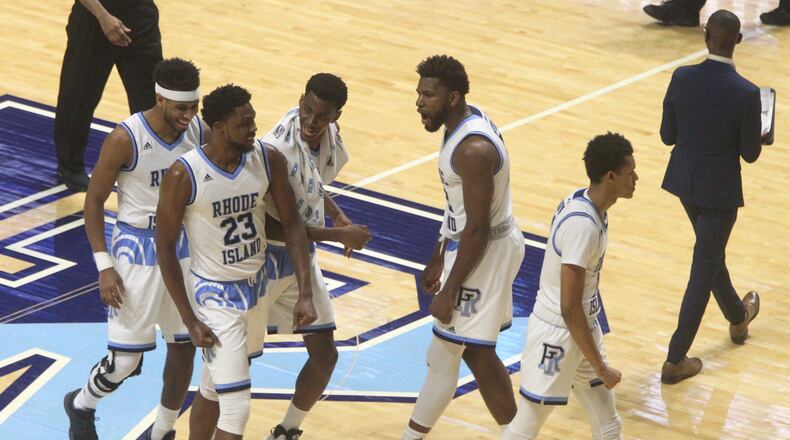 Rhode Island celebrates a basket in the first half. David Jablonski/Staff