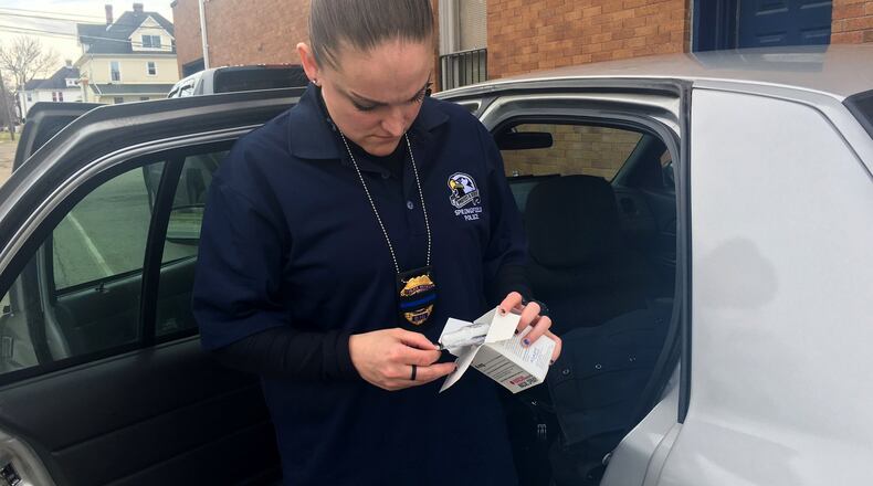 Springfield Police Opiate Diversion Officer Meredith Freeman works hand-in-hand with treatment specialists to get drug users into treatment. She has been in the position since late October and has been an officer for the past eight and a half years. ALLYSON BROWN/STAFF