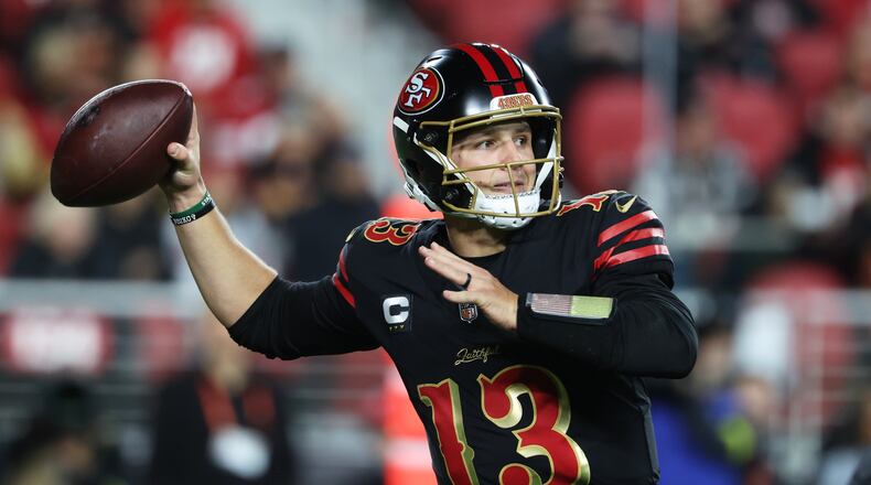 San Francisco 49ers quarterback Brock Purdy (13) passes against the Seattle Seahawks during the second half of an NFL football game in Santa Clara, Calif., Saturday, Jan. 3, 2026. (AP Photo/Jed Jacobsohn)