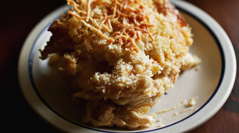 This Beer-baked Macaroni and Cheese is adapted from the Rackhouse Pub in Denver. With two sticks of butter, two cups of half-and-half and five different cheeses, it is over-the-top good. (Juli Leonard/Raleigh News & Observer/TNS)