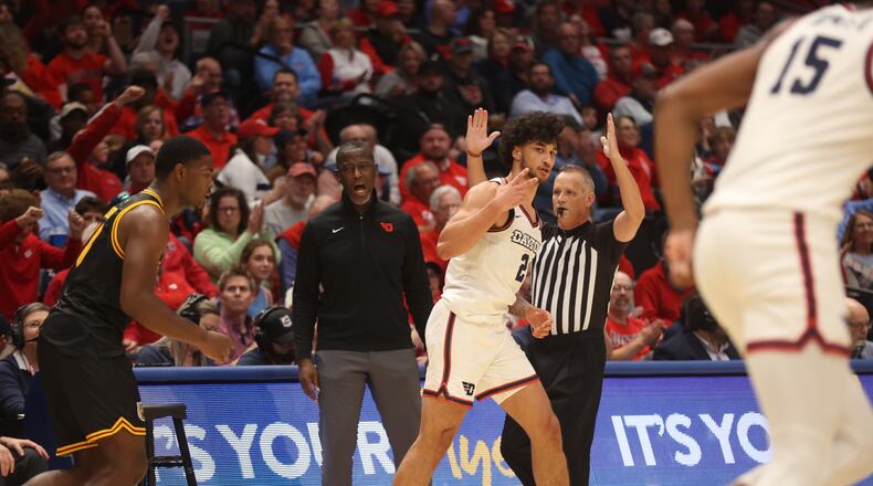 Dayton's Nate Santos celebrates after making a 3-pointer against Grambling State on Saturday, Dec. 2, 2023, at UD Arena. David Jablonski/Staff