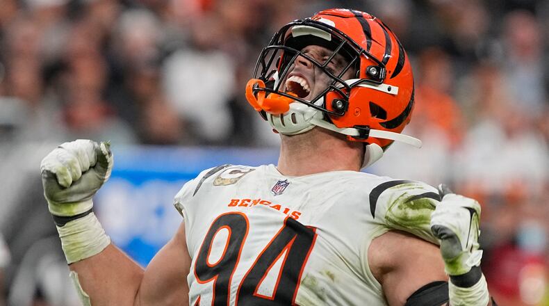 Cincinnati Bengals defensive end Sam Hubbard (94) reacts after making a tackle against the Las Vegas Raiders during the second half of an NFL football game, Sunday, Nov. 21, 2021, in Las Vegas. (AP Photo/Rick Scuteri)