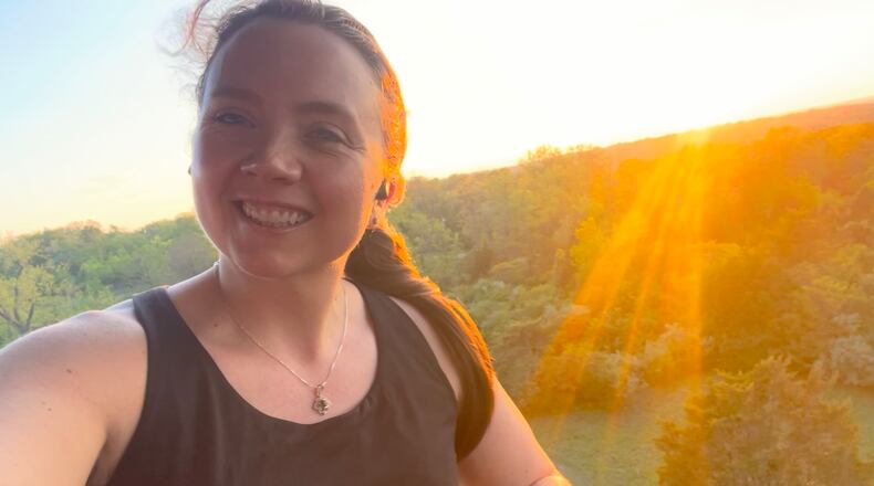 Lauren Hall suffered a stroke and two pulmonary embolisms in 2022. As part of her recovery process, she set a goal to hike 100 miles in 2024 and 300 miles in 2025. She is standing on the Tree Tower at Cox Arboretum in May of 2025. CONTRIBUTED