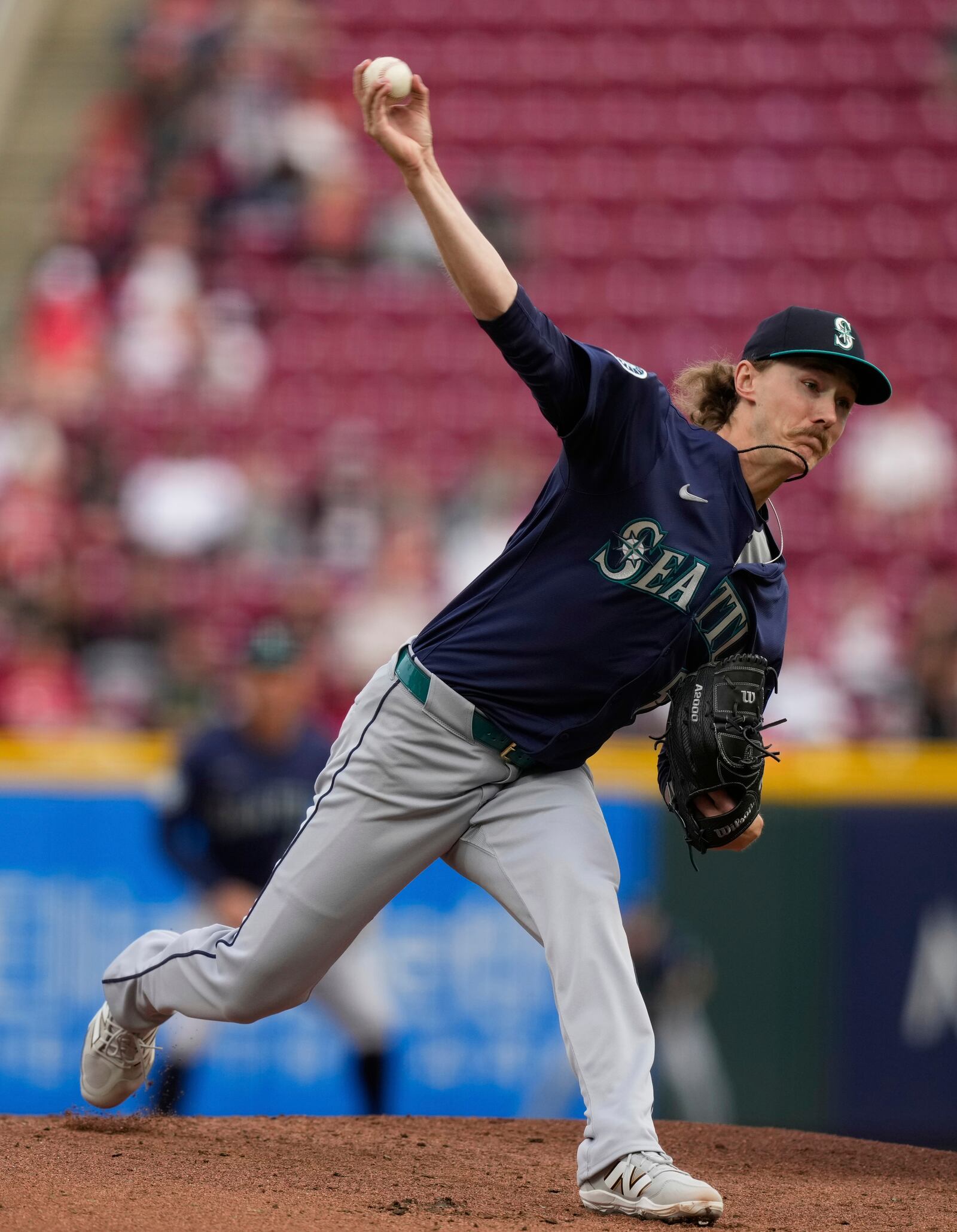Seattle Mariners pitcher Bryce Miller throws in the first inning of a baseball game against the Cincinnati Reds, Wednesday, April 16, 2025, in Cincinnati. (AP Photo/Carolyn Kaster)