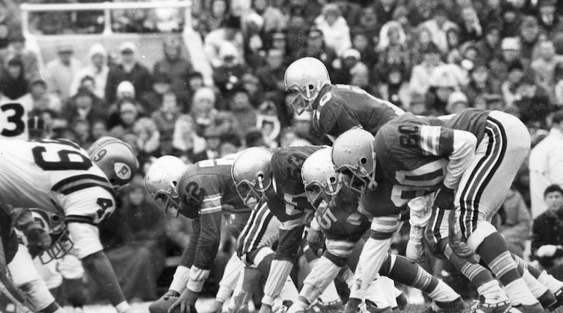 The Rex Kern-led Ohio State offense, flanked by Jan White (80) on the end, lines up against Purdue in 1969.