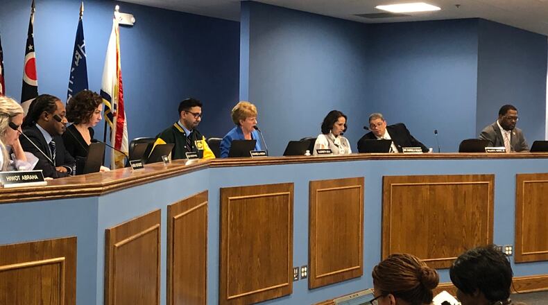 Dayton school board members and Superintendent Elizabeth Lolli at their January 2020 meeting after new members were sworn in.