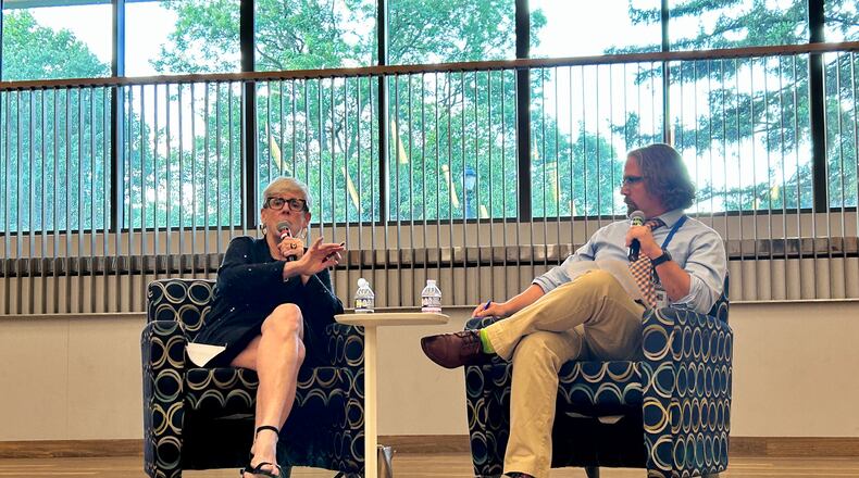 Retired Chief Justice Maureen O'Connor, left, answers questions about Issue 1, a redistricting reform that would bar politicians from drawing legislative districts. Dayton Daily News reporter Josh Sweigart, right, moderates the event at Dayton Metro Library. August 20, 2024.