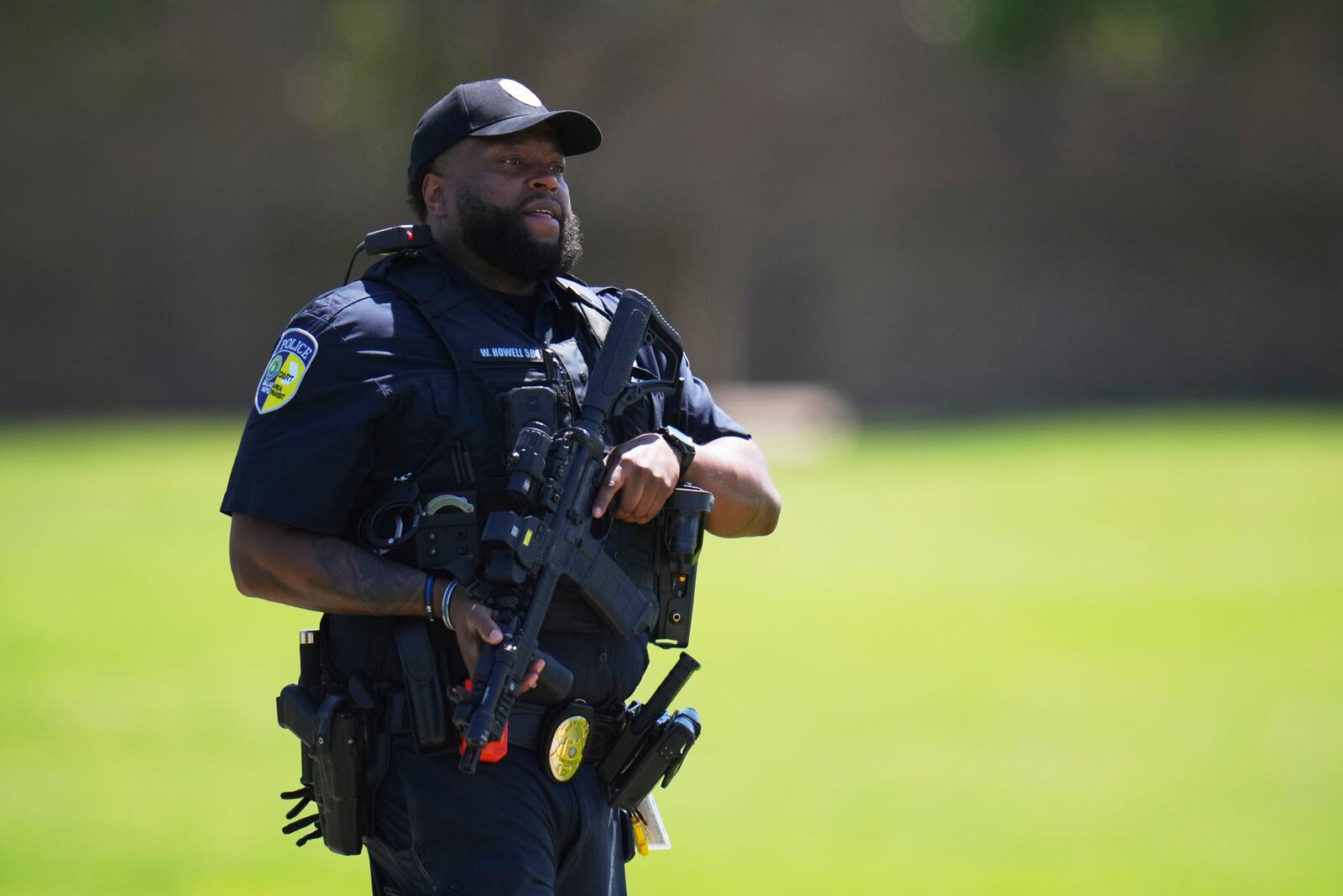 Police respond to reports of a shooting at Wilmer-Hutchins High School, in Dallas, Tx., Tuesday, April 15, 2025. (AP Photo/Julio Cortez)