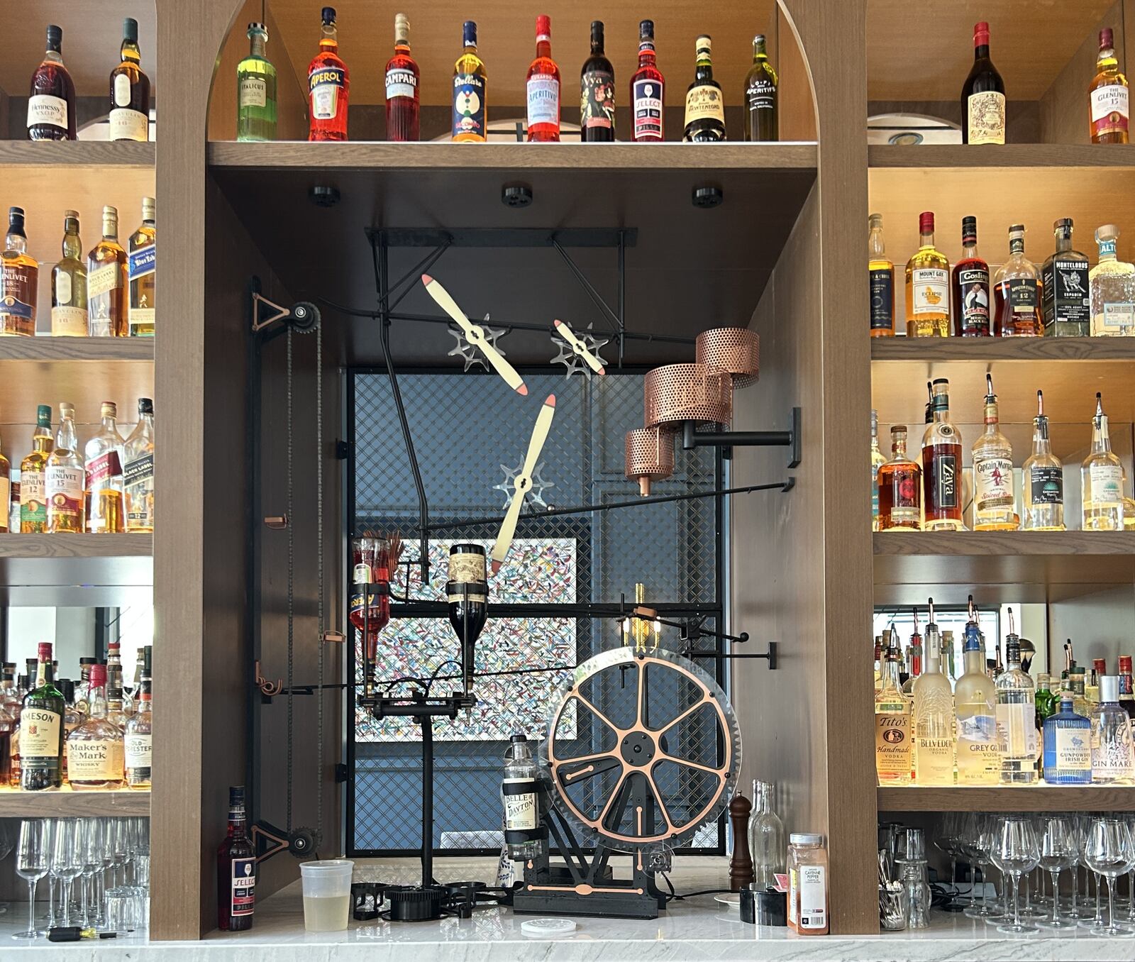Hotel Ardent design pays tribute to Dayton’s history of innovation. Dayton inventions are on display at the front desk. An NCR cash register is displayed in the private dining room. Guestrooms feature framed patents. A Rube Goldberg-like "Negroni Machine" makes cocktails with a press of a button. CONTRIBUTED/HANNAH KASPER